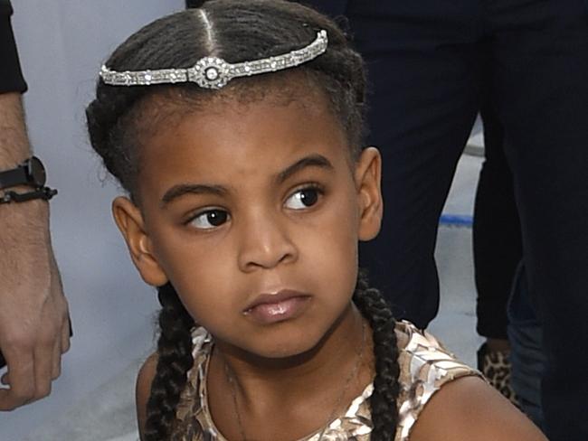 FILE - In this Aug. 28, 2016 file photo, Blue Ivy, daughter of Beyonce, arrives at the MTV Video Music Awards at Madison Square Garden in New York. At just 7, Blue Ivy Carter is an award-winning songwriter. Jay-Z and BeyoncÃ©â€™s daughter won the Ashford & Simpson Songwriterâ€™s Award at the Soul Train Awards on Sunday, Nov 17, 2019, for co-writing her momâ€™s hit â€œBrown Skin Girl,â€&#157; a song celebrating dark- and brown-skinned women. Ivy gives a vocal performance that opens and closes the song, which also features Wizkid and Saint Jhn.(Photo by Chris Pizzello/Invision/AP, File)