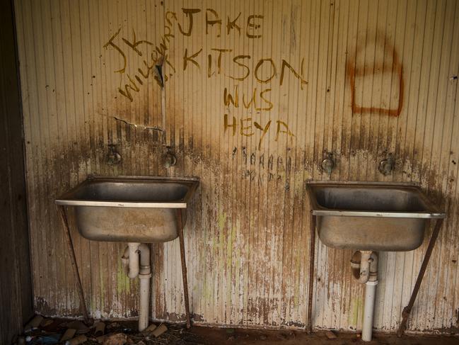 A bathroom block at Drive-In Camp which was disconnected from water and rubbish collection services at the beginning of the federal government’s 2007 Intervention. Picture: Andrew Quilty/Climate Council