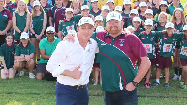 Federal MP for Petrie Luke Howarth with Deception Bay Little Athletics centre manager Adam White and some of the club's athletes.