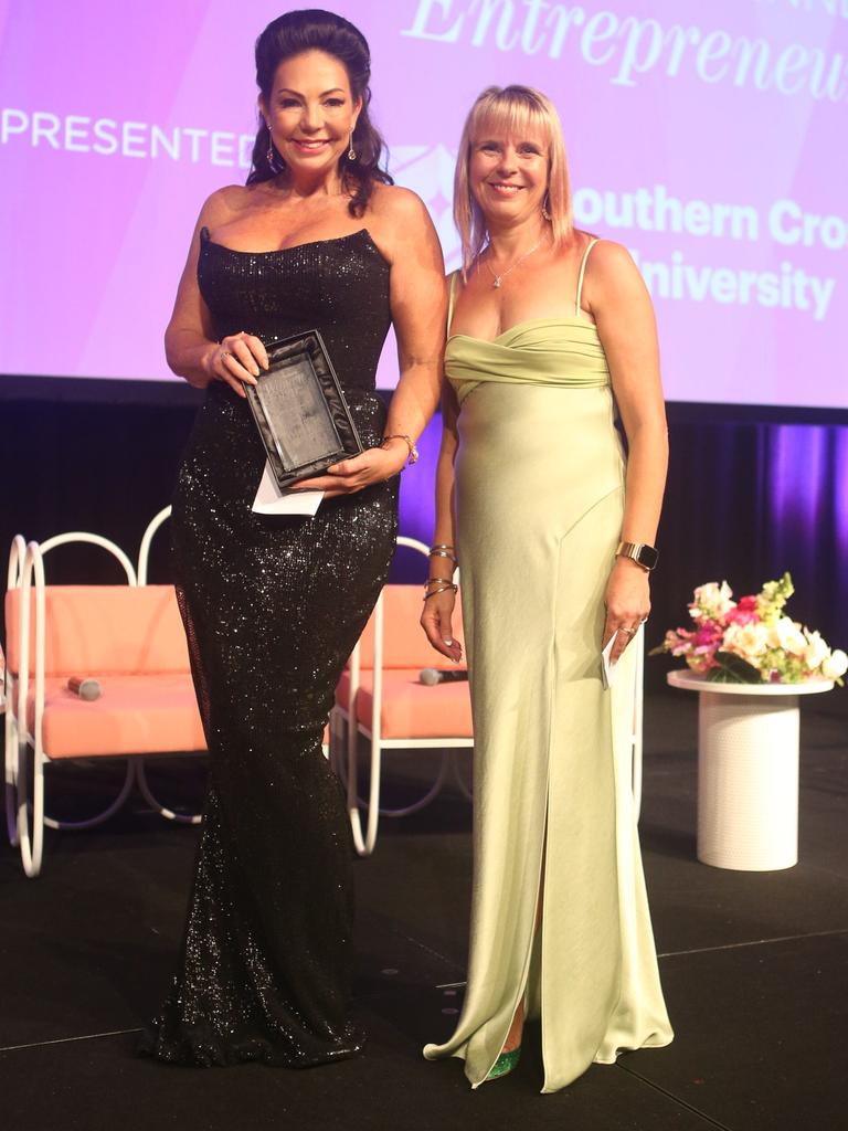 'Entrepreneurs' winner Cherie Uzan (left) and Julie Jomeen, of Southern Cross University, at the Gold Coast Bulletin Women of the Year awards by Harvey Norman at Star Gold Coast. Picture: Richard Gosling