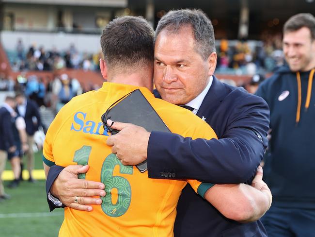 Wallabies coach Dave Rennie embraces Dave Porecki after defeating the Springboks. Picture: Cameron Spencer/Getty Images