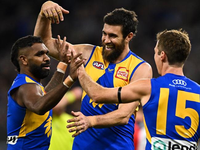 PERTH, AUSTRALIA - JUNE 24: Liam Ryan, Josh J. Kennedy and Jamie Cripps of the Eagles celebrates a goal during the 2022 AFL Round 15 match between the West Coast Eagles and the Essendon Bombers at Optus Stadium on June 24, 2022 in Perth, Australia. (Photo by Daniel Carson/AFL Photos via Getty Images)