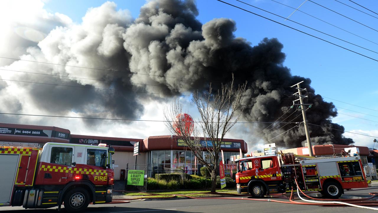 Fire crews at the scene of a large fire in an industrial estate at Thomastown in Melbourne's north. Picture: NCA NewsWire / Andrew Henshaw