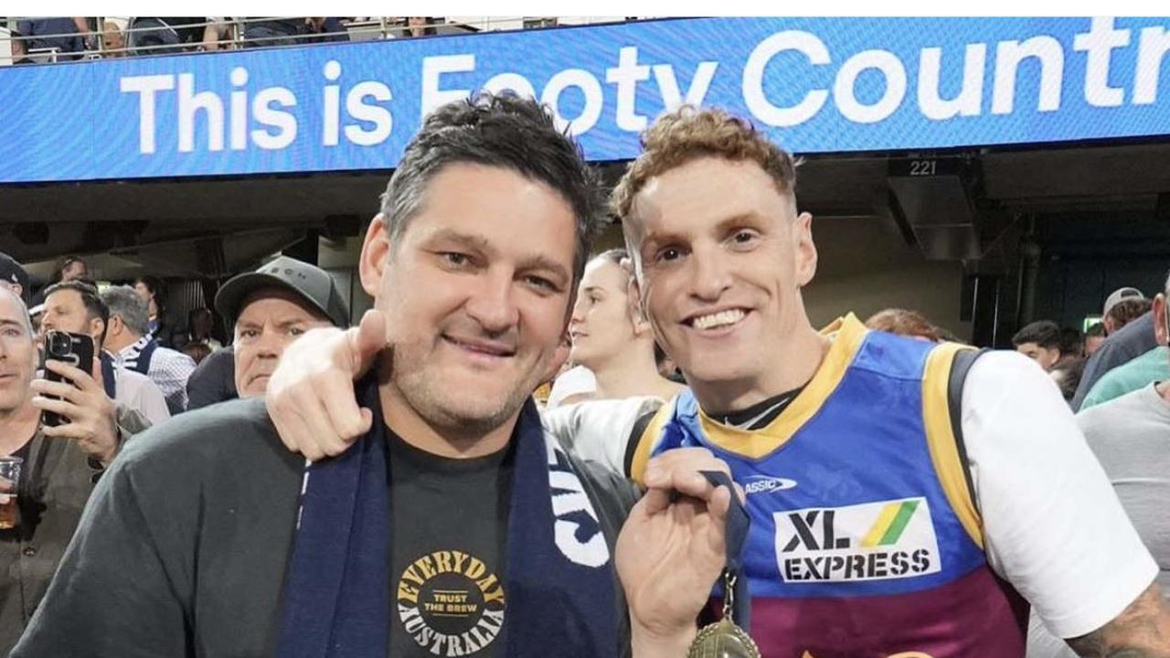 Brendan Fevola with Mitch Robinson at the Gabba