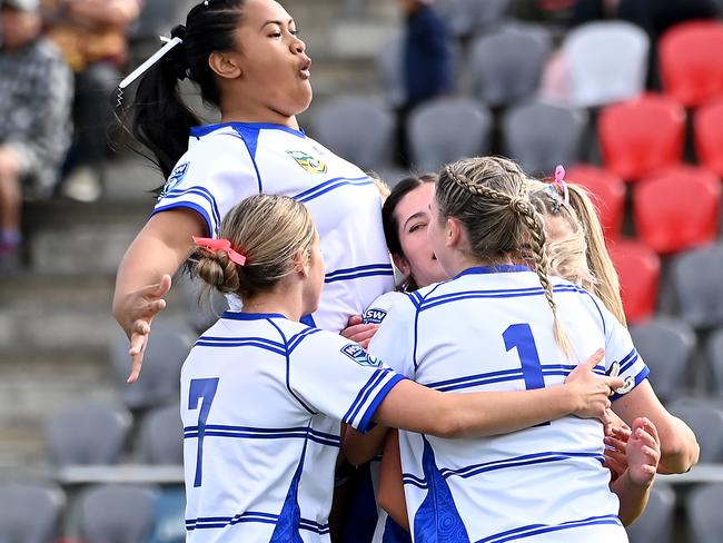 NSWCCC players celebrate a tryGirls NSWCCC Vs Victoria in the ASSRL national championships in Redcliffe.Saturday July 1, 2023. Picture, John Gass