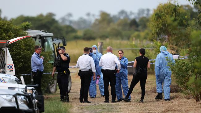 Police at the property at Woodhill near Beaudesert. Picture: Nigel Hallett