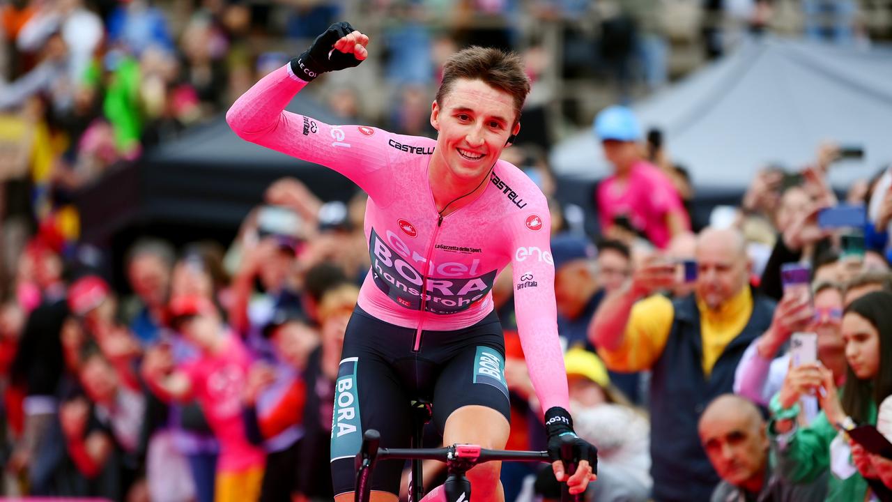 Hindley celebrates winning the Giro d’Italia. (Photo by Tim de Waele/Getty Images)