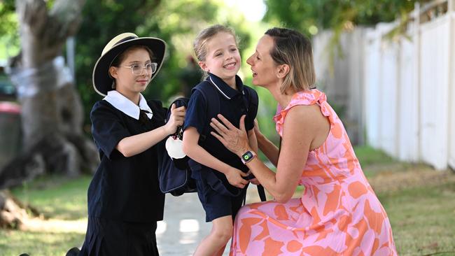 2/01/2023:  Melanie Walters with daughters Frances Hughes 4 (starting preps)and Isabella Hughes 9, arrive for the first day at school at St Margaret's Anglican Girls School in Ascot, Brisbane. pic Lyndon Mechielsen/Courier Mail