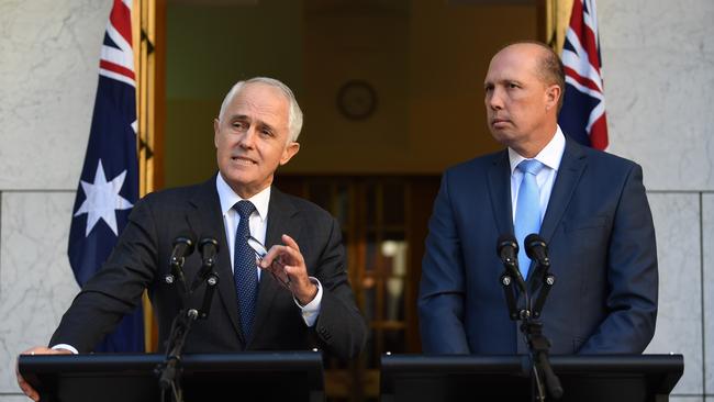 Australia's Prime Minister Malcolm Turnbull and Australia's Immigration Minister Peter Dutton speak during a press conference at Parliament House. Picture: AAP