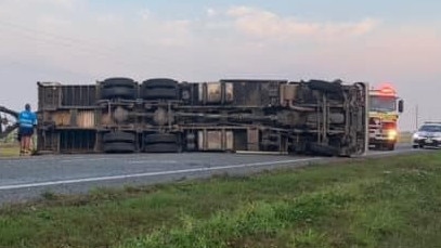 The Bruce Highway was blocked in both directions after a furniture truck rolled just south of Proserpine.