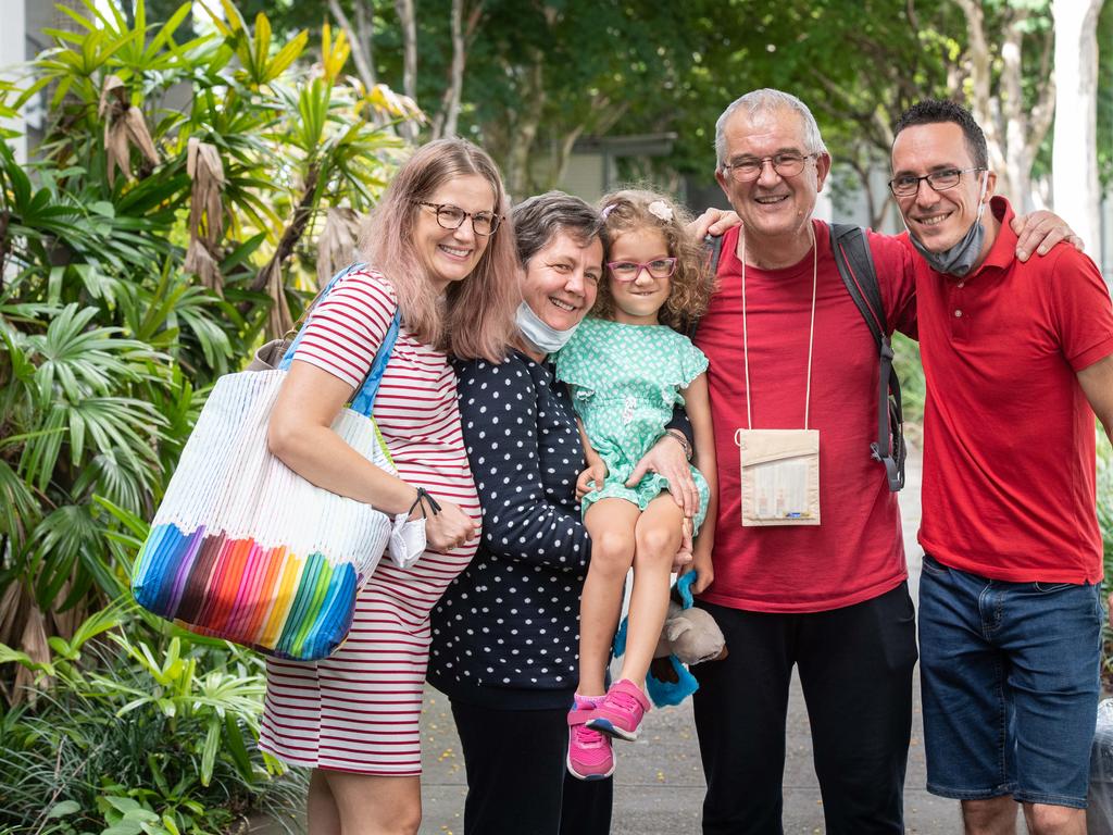 Zsofi Nemeth, Julianna Nemeth, Lili Kaity, 5, Rudolf Nemeth and David Kaity at Brisbane International airport as borders re-open. Picture: Brad Fleet