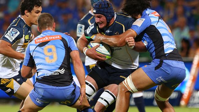 PERTH, AUSTRALIA - MARCH 01: Ben Mowen of the Brumbies gets tackled by Sam Wykes of the Force during the round three Super Rugby match between the Western Force and the ACT Brumbies at nib Stadium on March 1, 2014 in Perth, Australia. (Photo by Paul Kane/Getty Images)