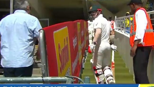 Australian opener David Warner is abused by a South African fan during Day 2 of the Third Test in Cape Town.