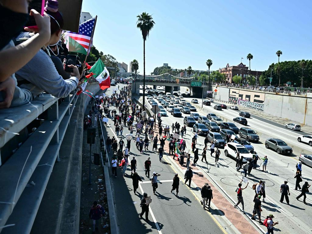 Demonstrators block the streets near the Metropolitan Detention Centre. Picture: AFP