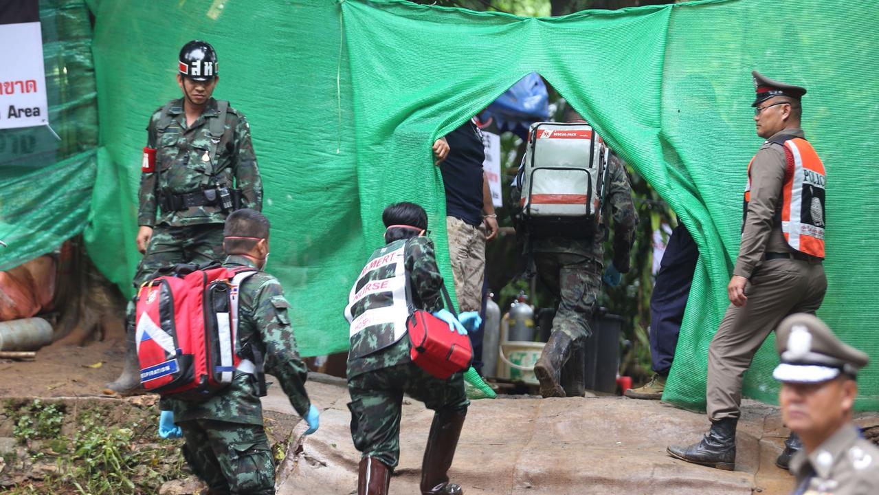 Thai military paramedics enter the Tham Luang cave area after divers evacuated some of the 12 boys and their coach. Picture: Supplied