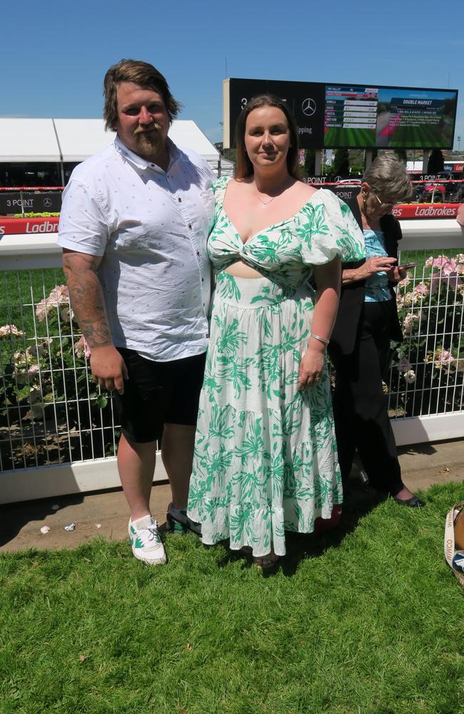 Meg Rawlins and partner together at the Cox Plate.