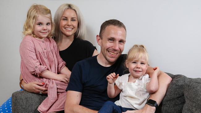 Paul and Hayley Abbey with their daughters Sadie(left) and Lottie(right). Picture: Ian Currie