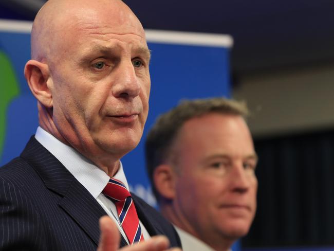 Treasurer Peter Gutwein (left) and Tasmanian Premier Will Hodgman speak with reporters about the State Budget. Picture: AAP IMAGE/ROB BLAKERS