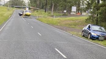 The rescue choppers land on Kandanga Imbil Rd on Australia Day, after a man was critically injured when his car left the road and hit a tree. Pics: RACQ Lifeflight