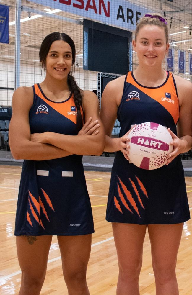 Firebird training partners and QUT Netball players Hulita Veve and Reilley Batcheldor will take Sapphire Series Sunday. Picture: Supplied Netball Qld