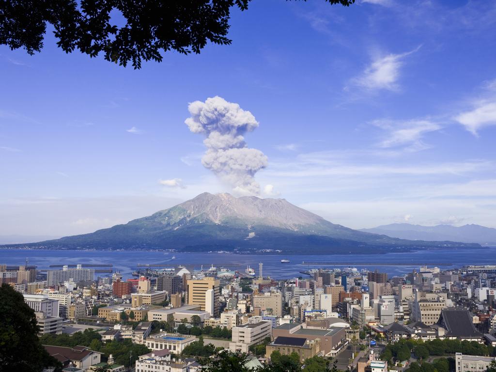 Kagoshima City, looking towards a previous eruption of the active volcano on Sakurajima, Japan. Picture: Supplied