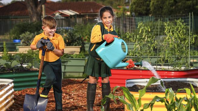 Hebersham Public School students Kingston Mawson, 9, and Jadila Namrawi, 8, in their vegie patch. Picture: Dylan Robinson