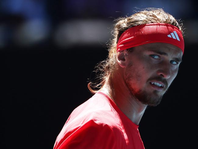 MELBOURNE, AUSTRALIA - JANUARY 24: Alexander Zverev of Germany reacts in the Men's Singles Semifinal against Novak Djokovic of Serbia during day 13 of the 2025 Australian Open at Melbourne Park on January 24, 2025 in Melbourne, Australia. (Photo by Graham Denholm/Getty Images)