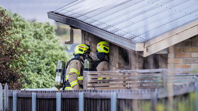 Tasmania Police and Tasmania Fire Service attend a house fire in Lucinda Parade, Lutana. Picture: RICHARD JUPE