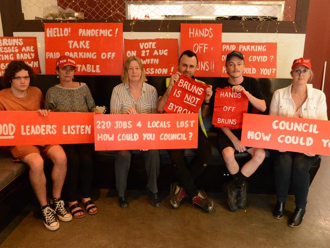 Breock and Cherie Heale, Kim Rosen, Happy Dolphin cafe owner Gary Deller, Nathan Kidman from Hoopers and Sam Pedlow from North Coast Lifestyle Properties. The group is opposing the rescission motion to bring a decision on paid parking in Brunswick Heads forward to this October. The rescission will go before Byron Shire Council on Thursday, August 27.