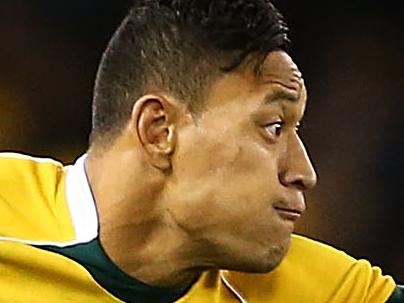 MELBOURNE, AUSTRALIA - JUNE 14: Israel Folau of the Wallabies runs the ball during the second International Test Match between the Australian Wallabies and France at Etihad Stadium on June 14, 2014 in Melbourne, Australia. (Photo by Mark Nolan/Getty Images)