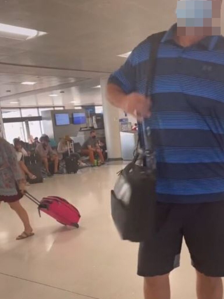 They asked to see his camera roll and he defensively declined. Picture: TikTok/@bailzherb