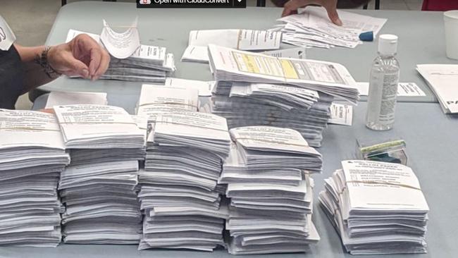 Electoral Commission of Queensland staffers begin the count in the Gold Coast City Council 2020 poll.