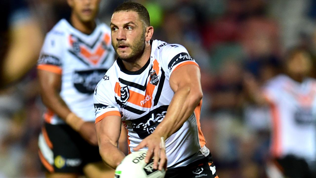 Robbie Farah pops a pass away in the Tigers win over the North Queensland Cowboys