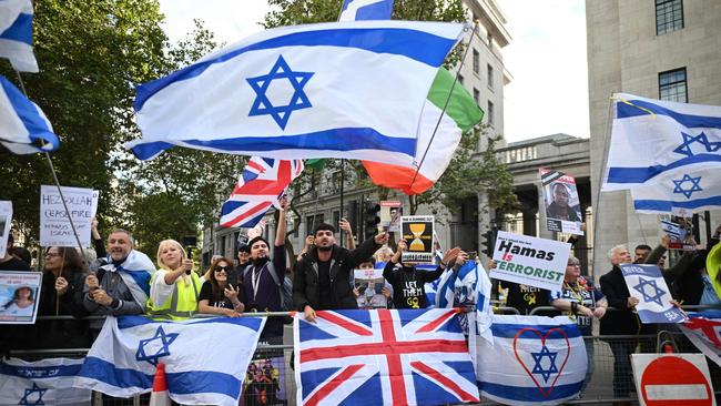 Pro-Israeli counter demonstrators shout at pro-Palestinian marchers in London. Picture: AFP