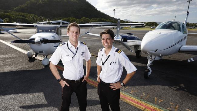 The Cairns Flight Training Centre has expanded its operations from one to three planes based at the Cairns Airport since opening in March. Cairns Flight Training Centre flight instructors Jordon Ward and Flinn Kelly will be available to field questions at the open day on Saturday. Picture: Brendan Radke