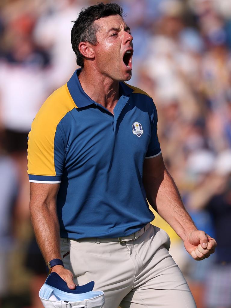 Rory McIlroy celebrates winning a match at the Ryder Cup. (Photo by Richard Heathcote/Getty Images)