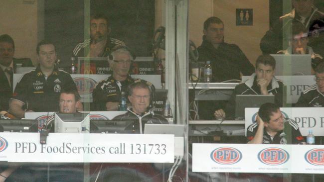 A stacked Collingwood coaches box in 2011.