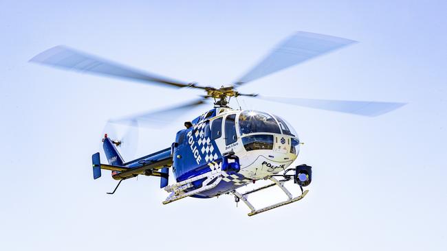 The Queensland Police POLAIR chopper is helping in the search. Picture: Richard Walker