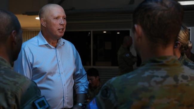 Defence Minister Peter Dutton speaks with military personnel at Lavarack Barracks in Townsville on April 8. Picture: Max Bree