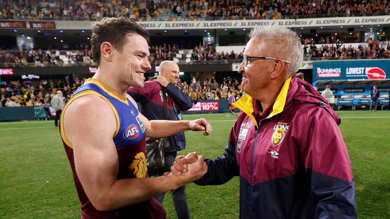 BRISBANE, AUSTRALIA - SEPTEMBER 01: Lachie Neale and Chris Fagan, Senior Coach of the Lions celebrate during the 2022 AFL Second Elimination Final match between the Brisbane Lions and the Richmond Tigers at The Gabba on September 1, 2022 in Brisbane, Australia. (Photo by Michael Willson/AFL Photos via Getty Images)