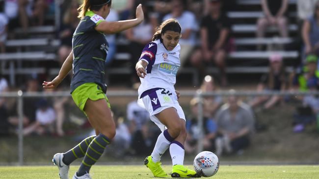 Perth Glory striker Sam Kerr fires the ball in to the danger area leading to own goal against Canberra United. Picture: AAP