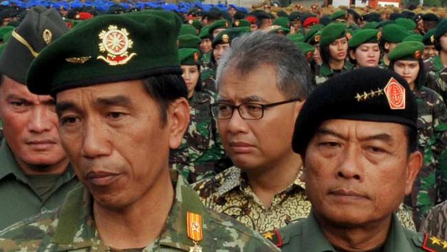 Indonesian President Joko Widodo, left, and his chief off staff, General Moeldoko, right. Picture: AFP