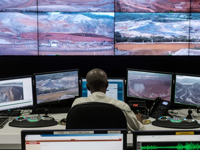 Employees of Brazilian mining company Samarco monitor rebuilding sites.