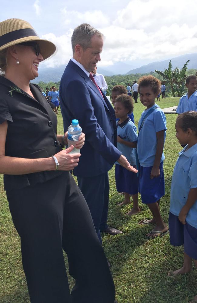 Opposition Leader Bill Shorten and wife Chloe meet local children at Kokoda Village. Picture: Supplied