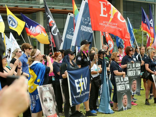 Union protestors from the Queensland Council of Unions (QCU) march through the Brisbane CBD in Brisbane, Wednesday, November 22, 2017. (AAP Image/Jono Searle) NO ARCHIVING