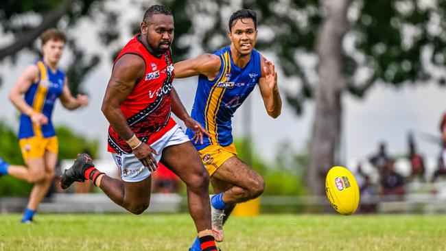 Paddy Heenan of Tiwi Bombers races for the ball against Wanderers in the 2022-23 NTFL season. Picture: Tymunna Clements / AFLNT Media