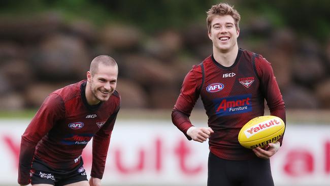 Essendon midfielders David Zaharakis and Zach Merrett ahead of the Friday night clash with the Crows.