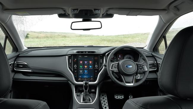 A massive tablet-style screen dominates the dash.