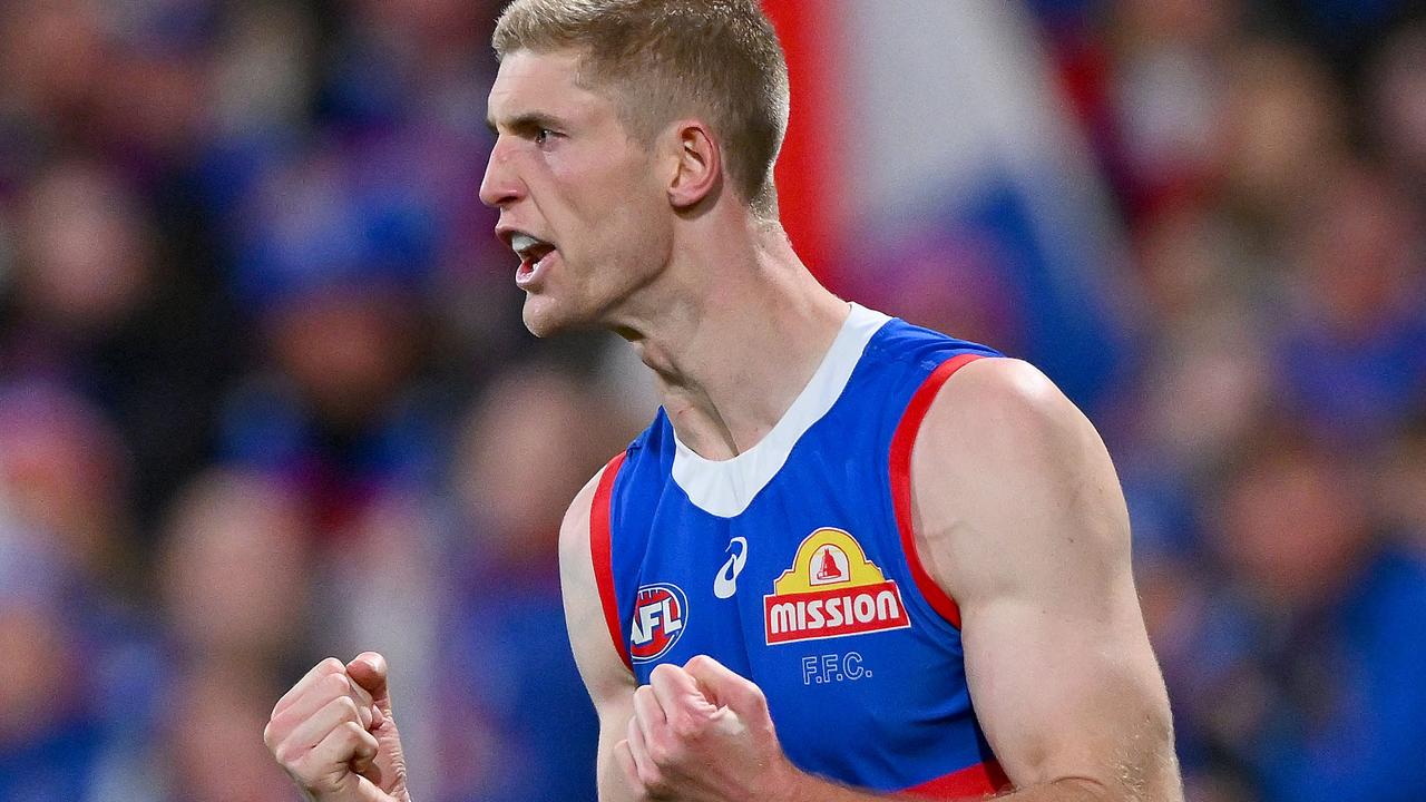 GEELONG, AUSTRALIA - AUGUST 26: Tim English of the Bulldogs celebrates a goal during the round 24 AFL match between Geelong Cats and Western Bulldogs at GMHBA Stadium, on August 26, 2023, in Geelong, Australia. (Photo by Morgan Hancock/Getty Images)