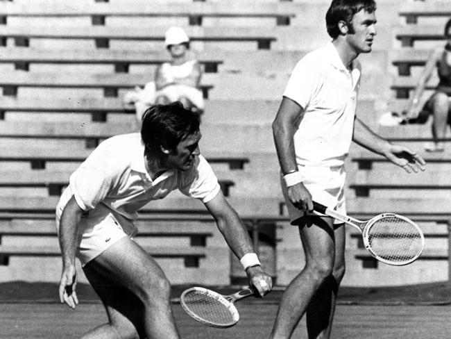 Tony Roche and John Newcombe won 12 Grand Slam doubles titles.